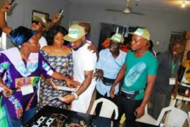 PHOTOS: Officials Gather To Take Selfies With Davido During His NYSC Registration In Lagos