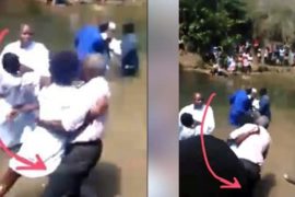 Lady Drags Pastor Into The River During Church Baptism (Video)