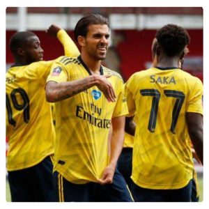 Arsenal players celebrating their win over Sheffield United in FA Cup