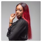 The Bbnaija Lockdown housemate, Tolanibaj in black top, red hair