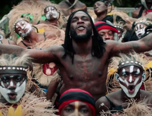 Burna Boy topless in Wonderful video