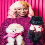 Watch DJ Cuppy Tongue Kissing Her Dog (Video)