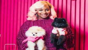 Watch DJ Cuppy Tongue Kissing Her Dog (Video)